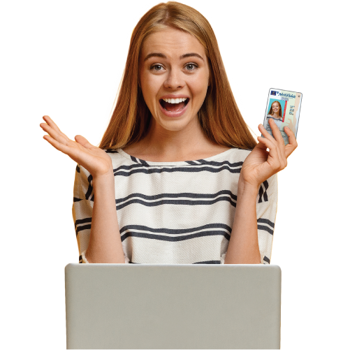 Girl on computer with new driver's license